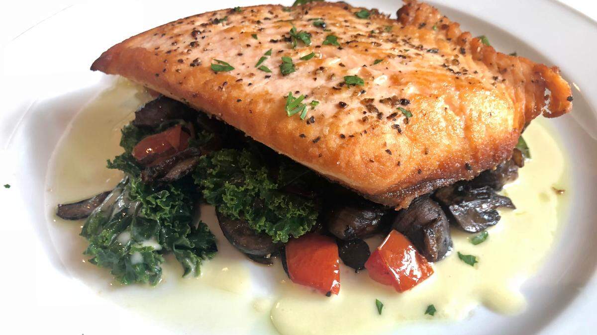 Salmon with mushrooms and kale is a special at B&B Butchers & Restaurant in Fort Worth.