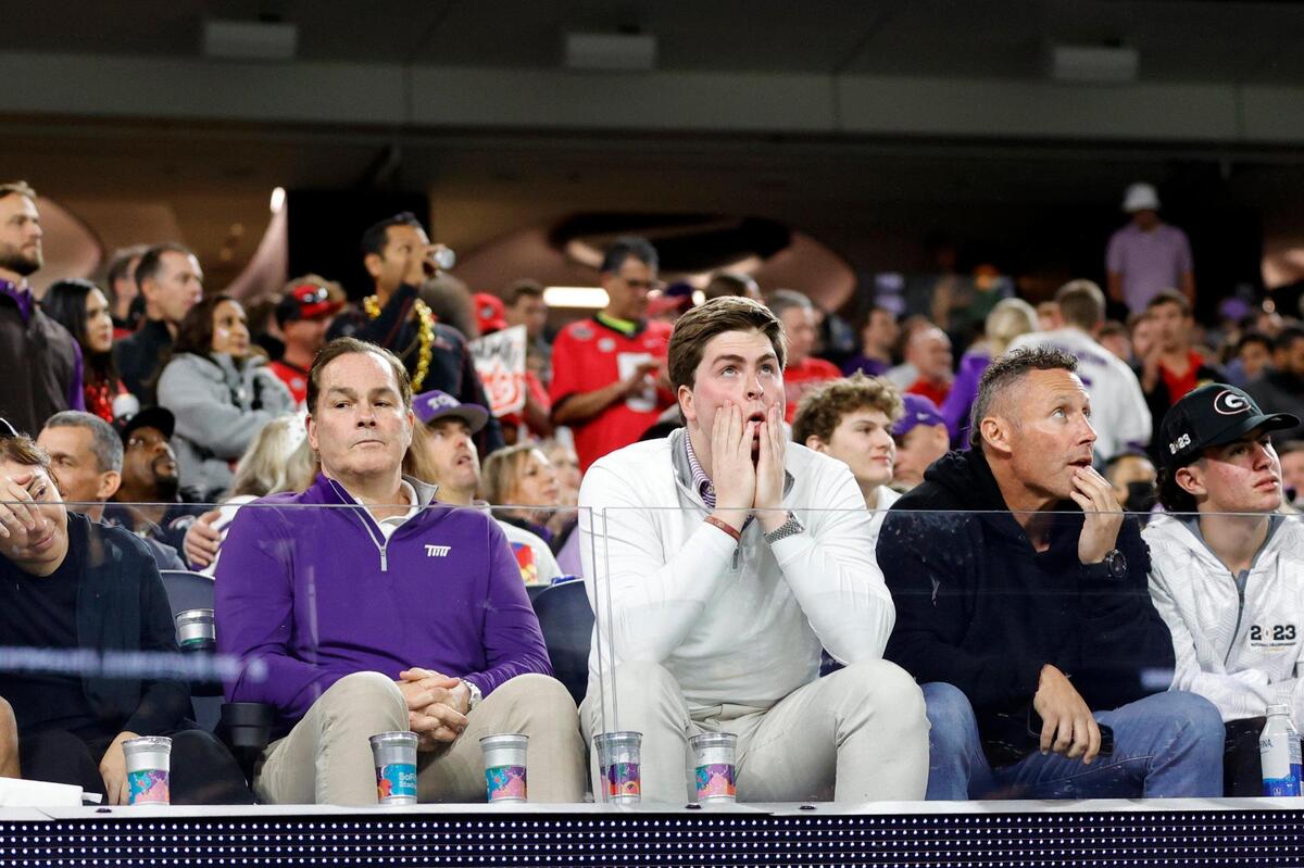 TCU fans react after losing possession during their game against Georgia in the College Football Playoff National Championship on Monday, Jan. 9, 2023, at SoFi Stadium in Inglewood, Calif. The Bulldogs defeated the Horned Frogs, 65-7.