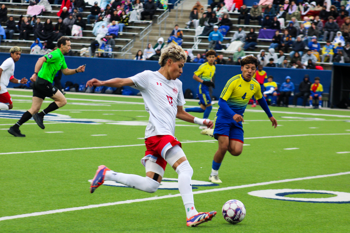 River Oaks Castleberry’s Chrisitian Serrato (17) dribbles upfield flanked by Nevada Community’s Anthony Esteris (4) in a Class 4A Division 1 state semifinal on Saturday, April 5, 2025 at McKinney ISD Stadium in McKinney, Texas. Castleberry defeated Community 2-0.