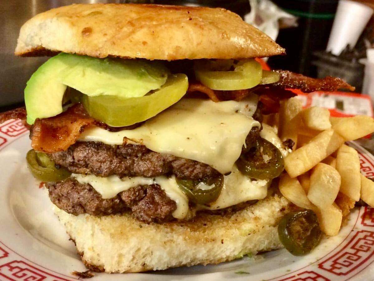 A burger at Salsa Joe’s Tex-Mex Smokehouse, a restaurant on West Park Row Drive in Arlington, Texas.