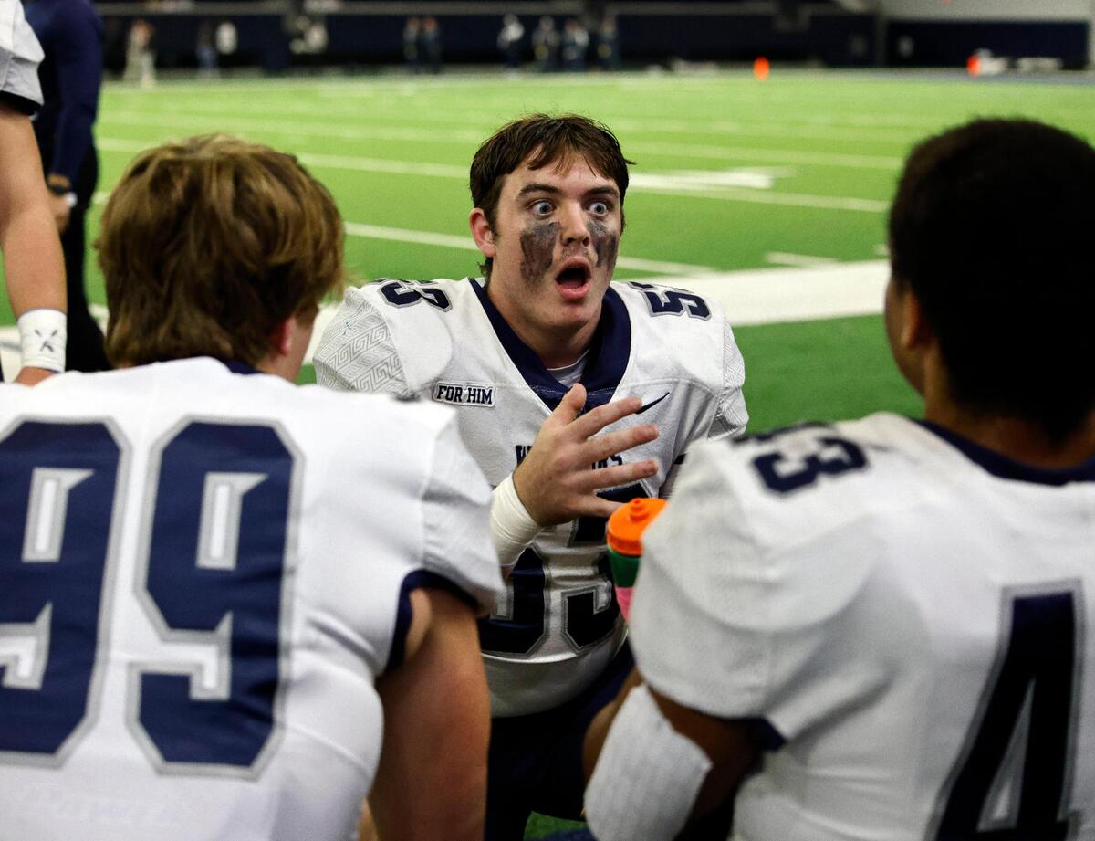 Liberty Christian lineman Ian Mitchell (53) coaches up team mates in the first half of a TAPPS Region 2 semi-final football playoff game at The Ford Center in Frisco, Texas, Saturday, Oct. 25, 2023. Liberty Christian led All Saints 24-14 at the half. (Special to the Star-Telegram Bob Booth)