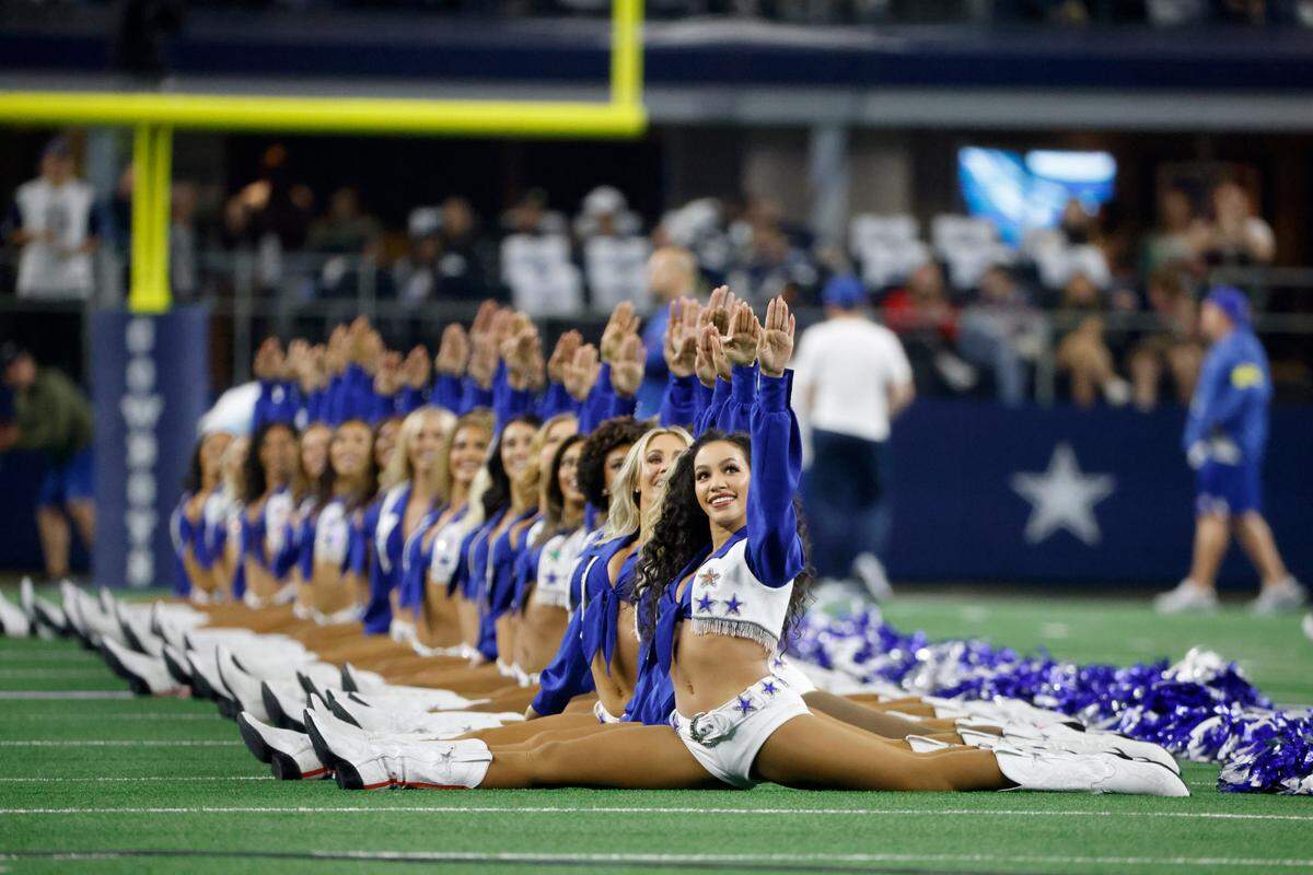 The Dallas Cowboys Cheerleaders perform prior to a recent game at AT&T Stadium.