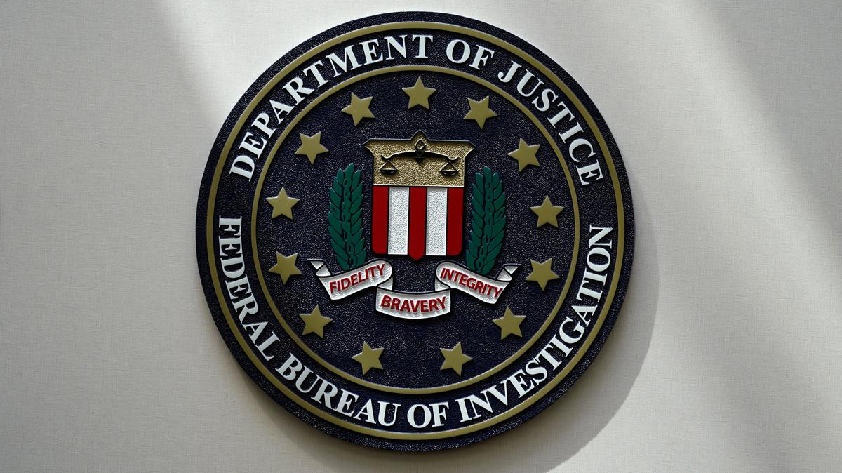 FILE - An FBI seal is seen on a wall on Aug. 10, 2022, in Omaha, Neb. The FBI says the majority of trafficking cases in the U.S. over the past decade have come from the South.