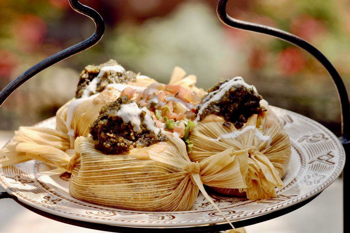 Reata’s tenderloin tamales with pecan mash are the restaurant’s signature dish.