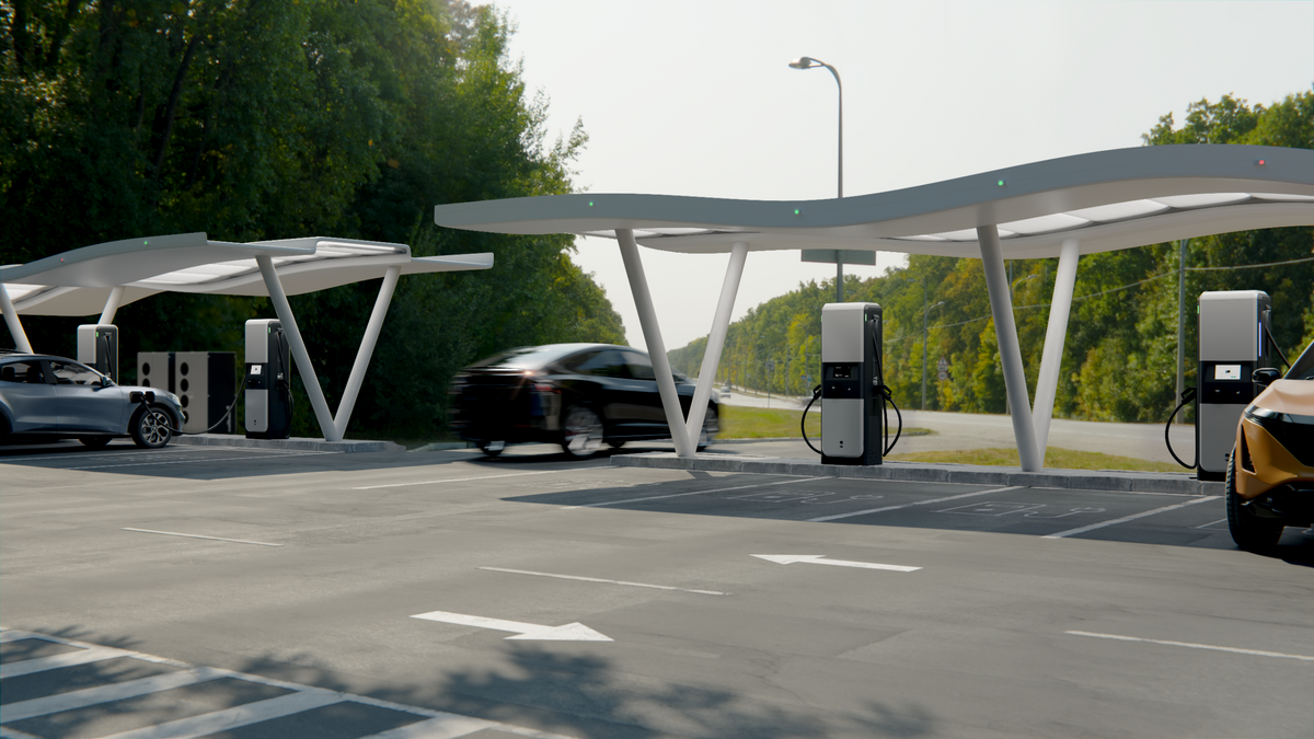 A rendering of a large electric vehicle charger on the side of a highway for public EV use.