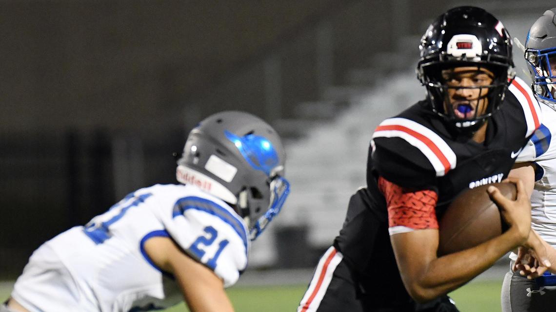 Weatherford’s Brendon Lopez, left chases Trinity quarterback Marcus Ervin as he scrambles for yards in the first quarter during Friday’s October 18, 2019 football game at Pennington Field in Bedford, Texas. Special/Bob Haynes