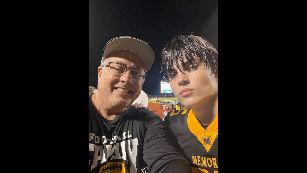 Jeff Metcalf with his son Austin, who was MVP on the Frisco Memorial High School football team.&nbsp;