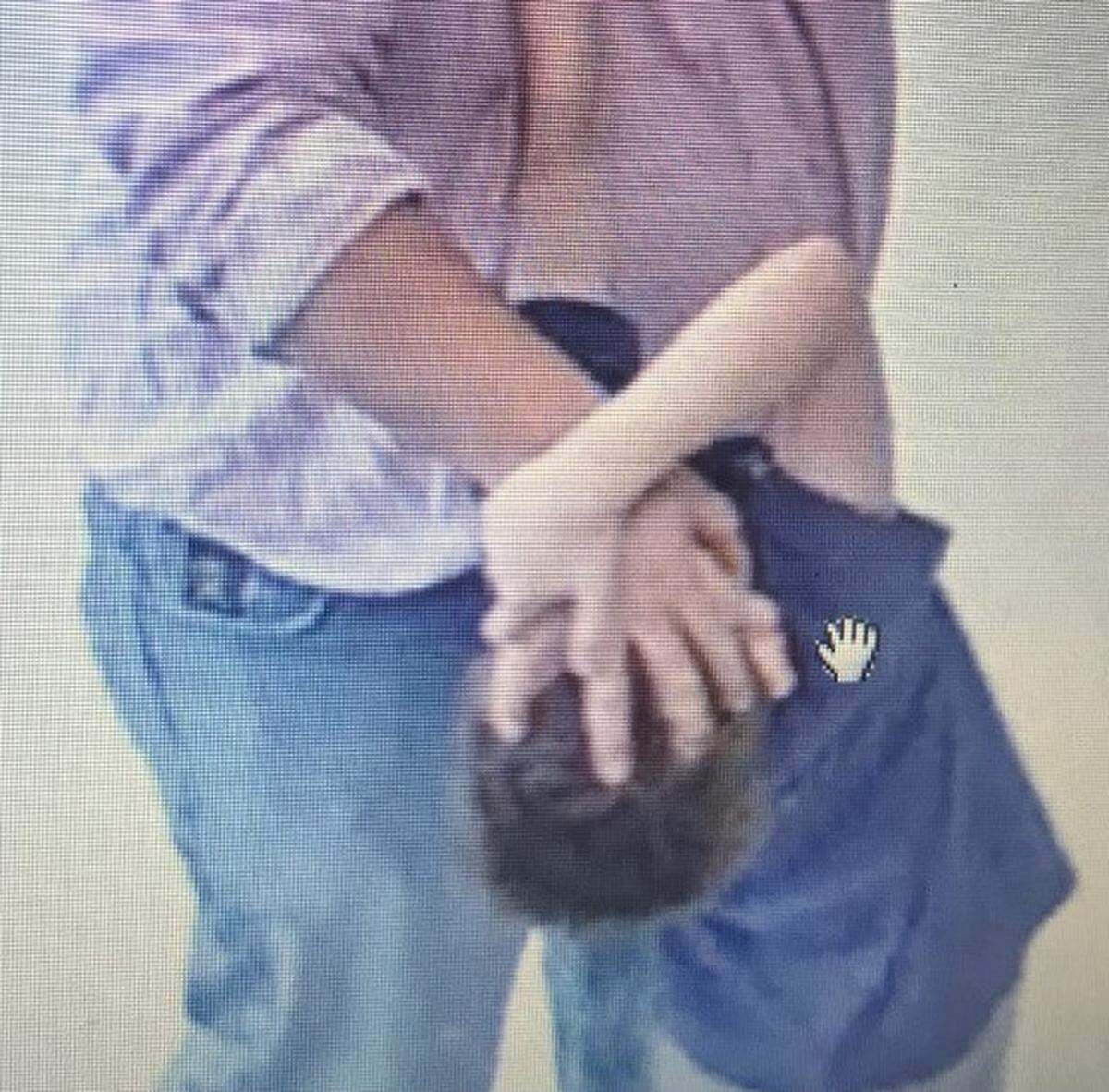 Staff at a Weatherford elementary school restrained a 7-year-old on the autism spectrum multiple times per day within a 53-day period, according to a lawsuit from the student’s mother. In this screen grab of surveillance footage, a staff member put his hand over the child’s face.