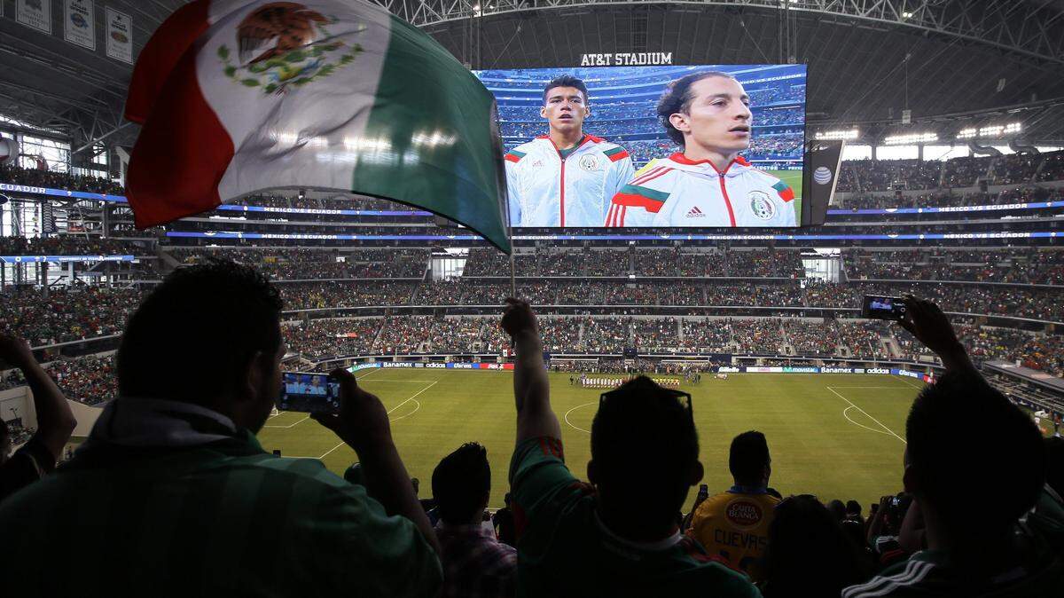 Mexico fans at AT&T Stadium in 2014, before a match against Ecuador. Arlington's AT&T Stadium is one of just three sites under consideration to host the final match of the 2026 FIFA World Cup tournament, a sports commission official said.