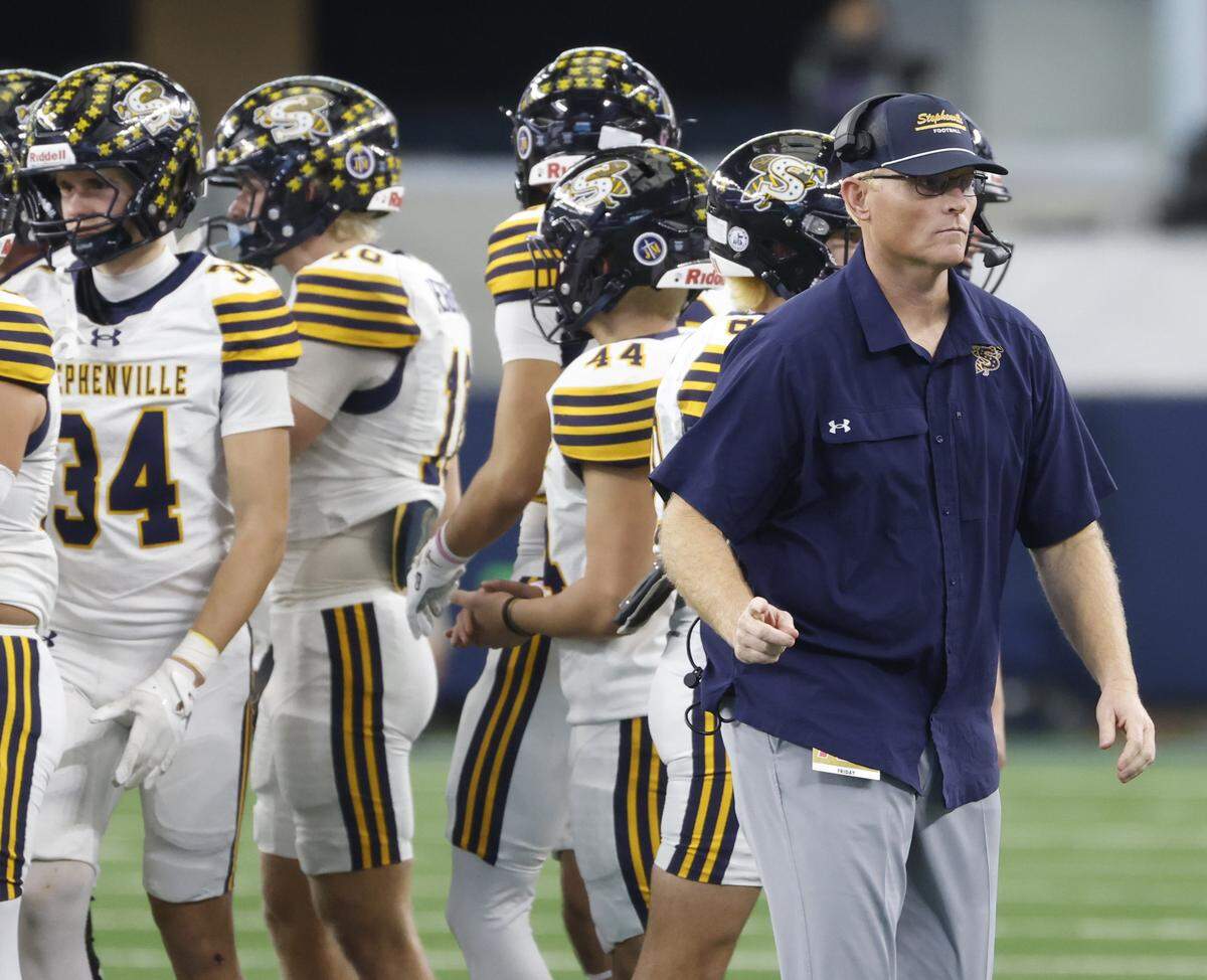 Stephenville head coach Sterling Doty heads back to the sidelines after a time out during the second half of the UIL Class 4A Division I championship game on Friday Dec. 19, 2025 at AT&T Stadium in Arlington, Texas.