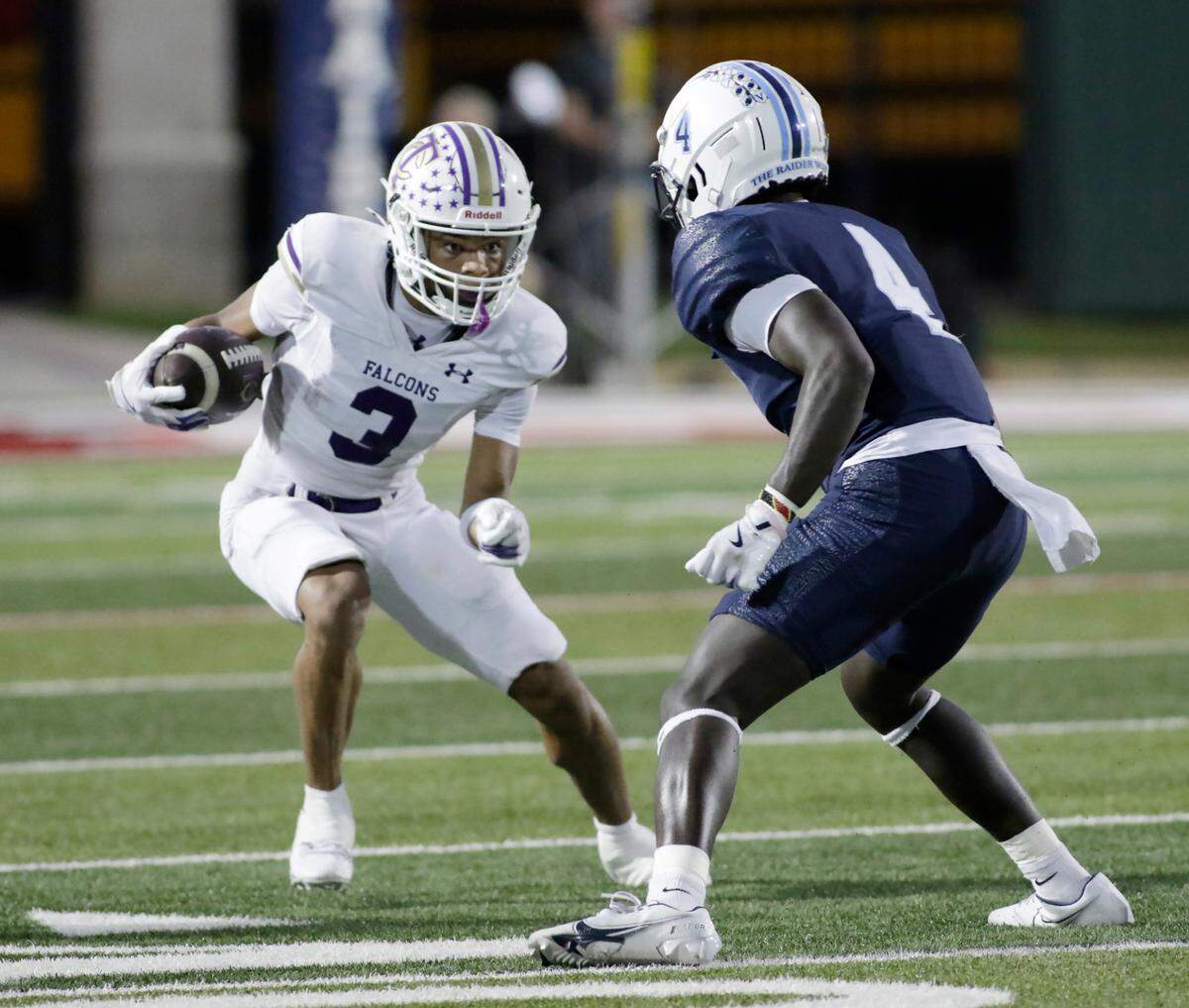Timber Creek’s Antwan Bridges tries to escape L.D. Bell’s George Getanda during their UIL football game Friday night at Pennington Field In Hurst on Friday Sept. 6, 2024.