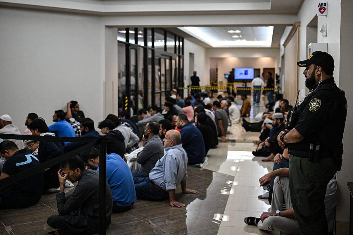 Muslims pray at a mosque during Friday prayers, in Plano, Texas, on April 11, 2025. Threats to Muslims living in Texas are nothing new, but lately the vile phone calls to Imran Chaudhary have ramped up. The cause? Chaudhary's early plans for construction of 1,000 new homes, a community center, school, hospital and -- controversially -- a mosque and Islamic private school to serve the growing Muslim community near East Plano, in a thinly populated corner of east Texas. One anonymous caller says, in an expletive filled message, "I suggest you get the fuck out of America while it's still an option." (Photo by RONALDO SCHEMIDT / AFP) (Photo by RONALDO SCHEMIDT/AFP via Getty Images)