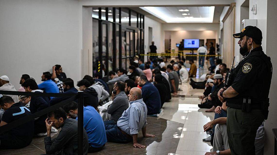Muslims pray at a mosque during Friday prayers, in Plano, Texas, on April 11, 2025. Threats to Muslims living in Texas are nothing new, but lately the vile phone calls to Imran Chaudhary have ramped up. The cause? Chaudhary's early plans for construction of 1,000 new homes, a community center, school, hospital and -- controversially -- a mosque and Islamic private school to serve the growing Muslim community near East Plano, in a thinly populated corner of east Texas. One anonymous caller says, in an expletive filled message, "I suggest you get the fuck out of America while it's still an option." (Photo by RONALDO SCHEMIDT / AFP) (Photo by RONALDO SCHEMIDT/AFP via Getty Images)