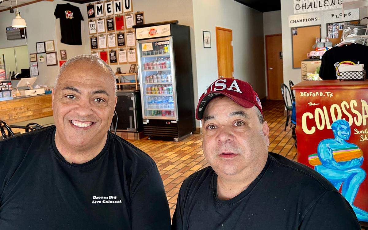 Jonathan Merrill, left, and Terry Duncan cooked in hotels before opening the Colossal Sandwich Shop.