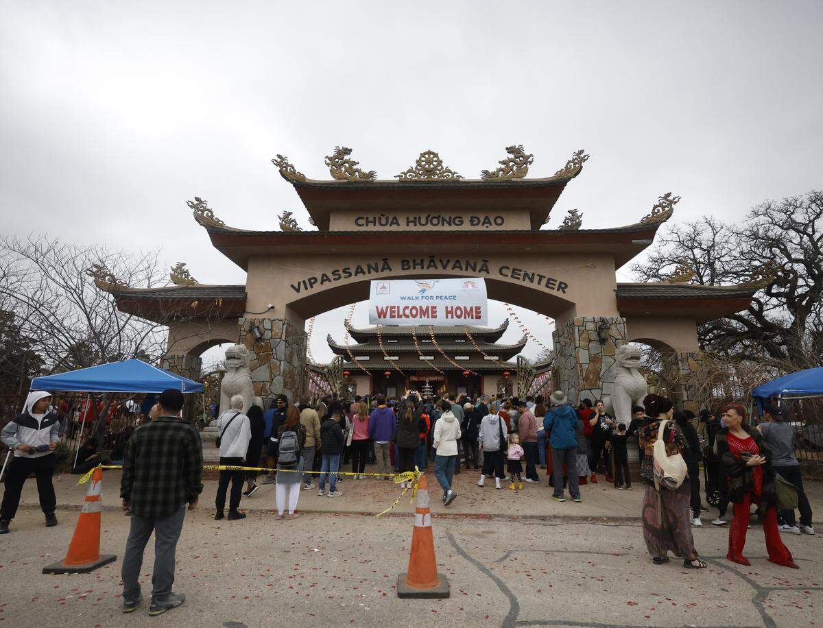 Hundreds fill the Húóng Do Vipassana Bhavana Center to welcome home the Buddhist monks who walked nearly 2,300 miles to Washington D.C. for Peace in Fort Worth, Texas, Saturday Feb. 14, 2026.