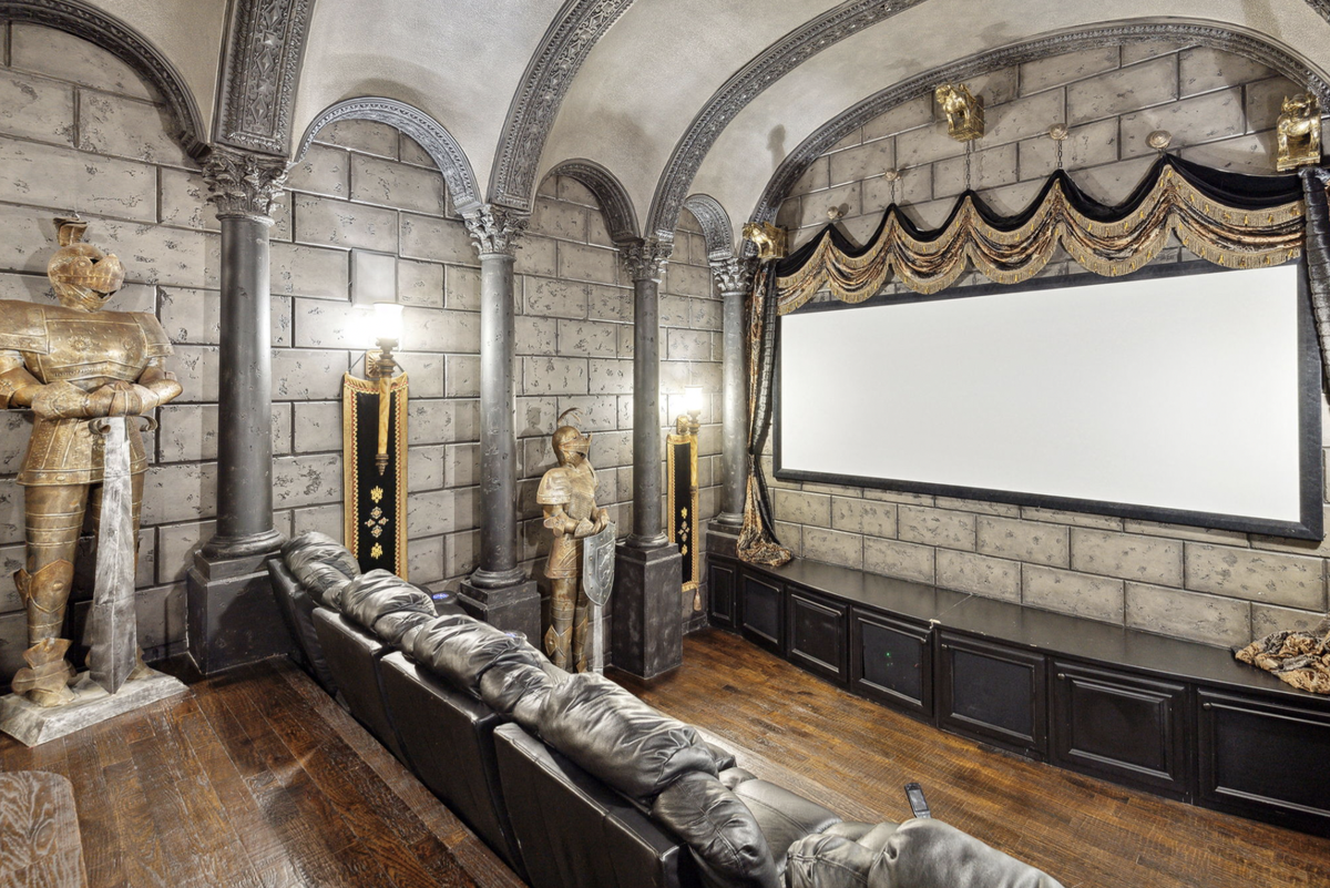 The home’s custom theater has regal charm. (Provided by Briggs Freeman Sotheby’s International Realty)