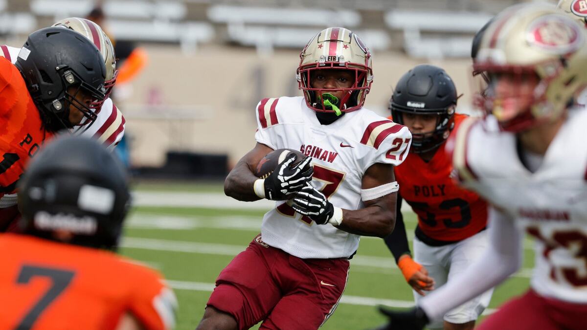 Saginaw running back Reginald Ryan (27) works the lane during a UIL football game at Farrington Field in Fort Worth Saturday, Sept. 14, 2024.