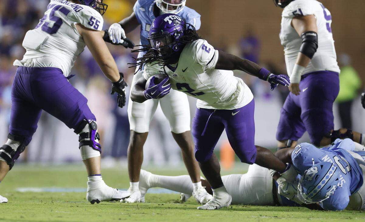 TCU running back Kevorian Barnes (2) gains yards during the first half Monday in Chapel Hill, N.C.