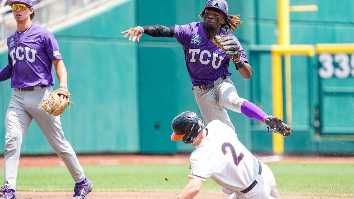 TCU Horned Frogs second baseman Tre Richardson (0) throws after getting out Virginia Cavaliers center fielder Ethan O’Donnell (2) during their College World Series game on Sunday.