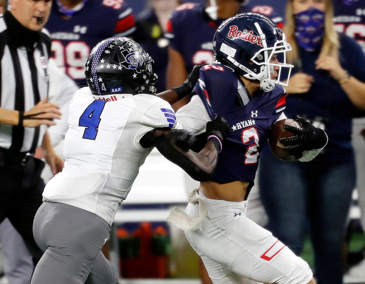 Denton Ryan wide receiver Billy Bowman Jr. (2) outruns Summit defensive back Jalon Rock (4) down the sidelines during the Conference 5A Division 1 2020 state championship semi-final football game at AT&T Stadium in Arlington, Texas, Friday, Jan. 08, 2021. Ryan led Summit 21-13 at the half. (Special to the Star-Telegram Bob Booth)