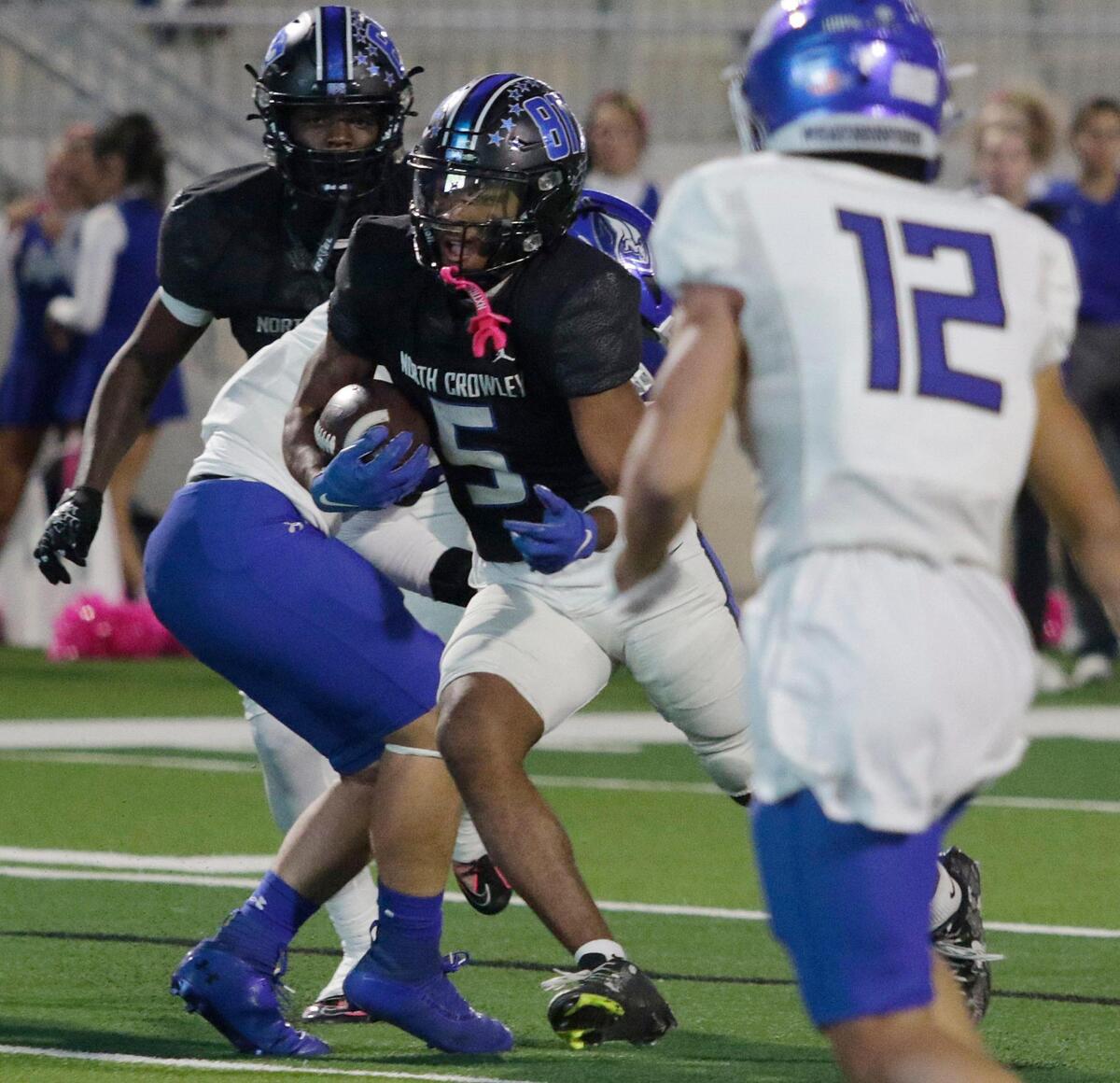 North Crowley’s Daniel Bray finds a hole during a UIL football game at Crowley ISD Multi Purpose Stadium on Friday, October 18, 2024.