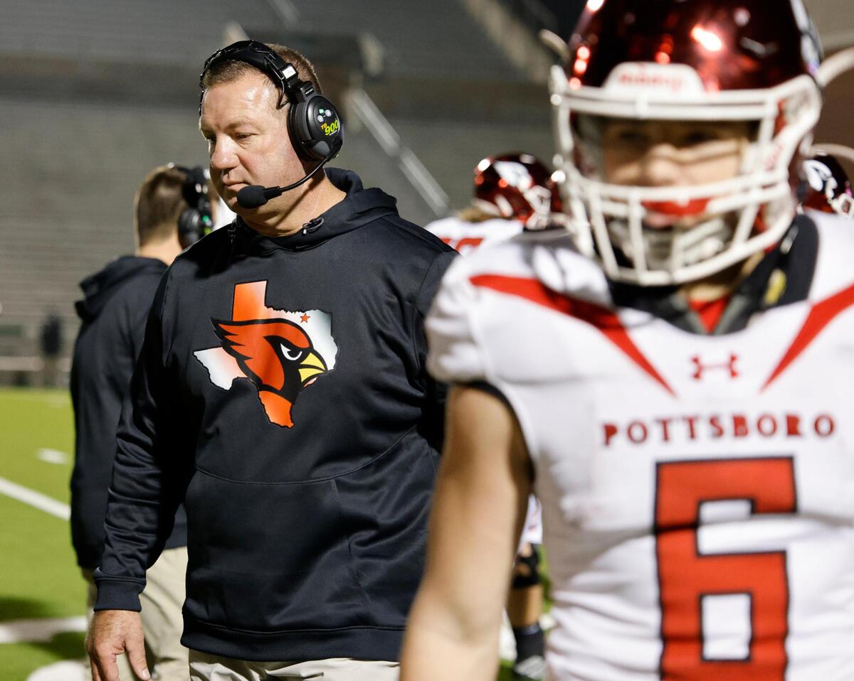 Pottsboro head coach Matt Poe walks off the field after a timeout in the second half of a UIL Class 3A Division 1 area round playoff football game at Mesquite Memorial Stadium in Mesquite, Texas, Thursday, Nov. 16, 2023. Grandview defeated Pottsboro 56-42 to advance to the regional finals. (Special to the Star-Telegram Bob Booth)