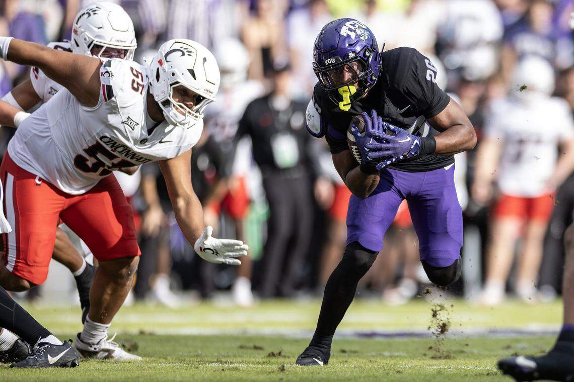 TCU running back Jeremy Payne (26) rushes upfield in the first half of a Big XII conference game between the TCU Horned Frogs and the Cincinnati Bearcats at Amon G Carter Stadium in Fort Worth on Saturday, Nov. 29, 2025.
