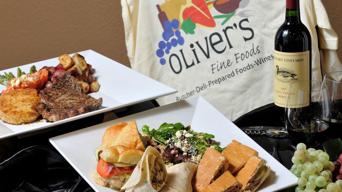 A file photo of some of the selections offered at the opening of Oliver’s Fine Foods in Mansfield: Marylan-style crab cake, blue cheese tomato, a ribeye steak and other vegetables, Cuan press pannini and balsamic chicken salad. The restaurant/grocery will close after service Dec. 15, 2018.