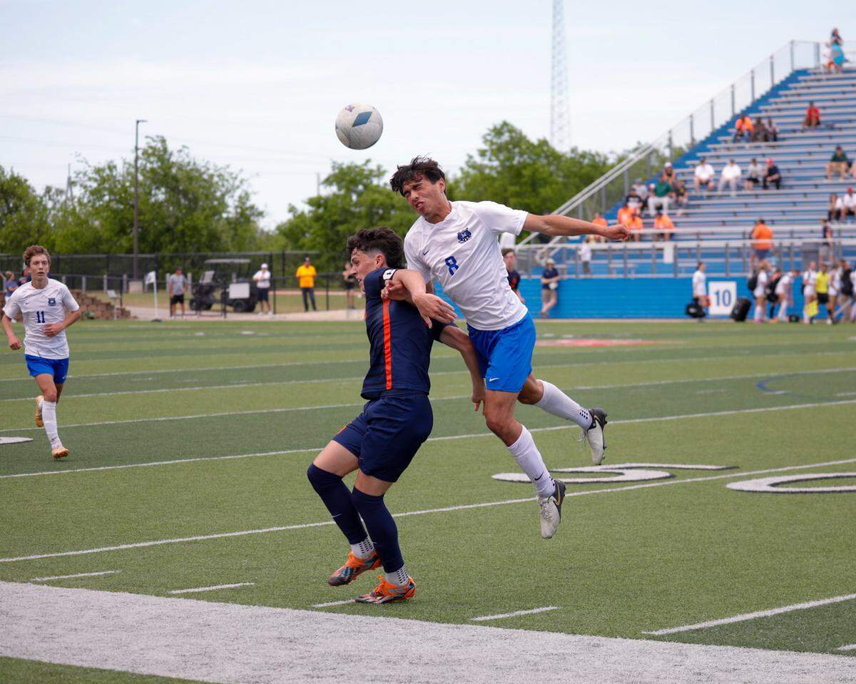 Midlothian’s Preston Stanphill goes for a header in the Class 5A state championship against Frisco Wakeland at Birkelbach Field on April 13, 2024.