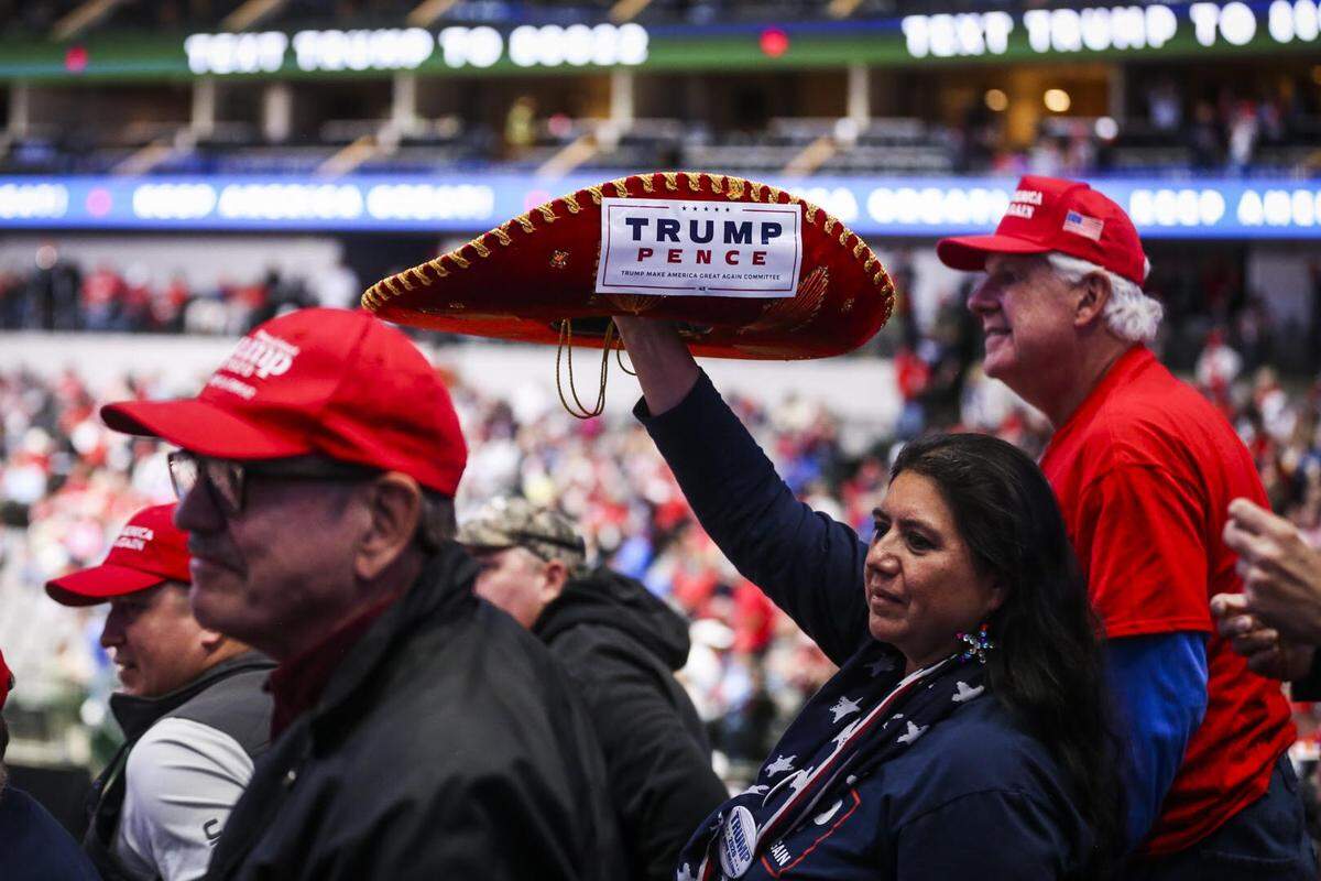 Fans await President Donald Trump at the Americans Airlines Center in Dallas on Thursday.