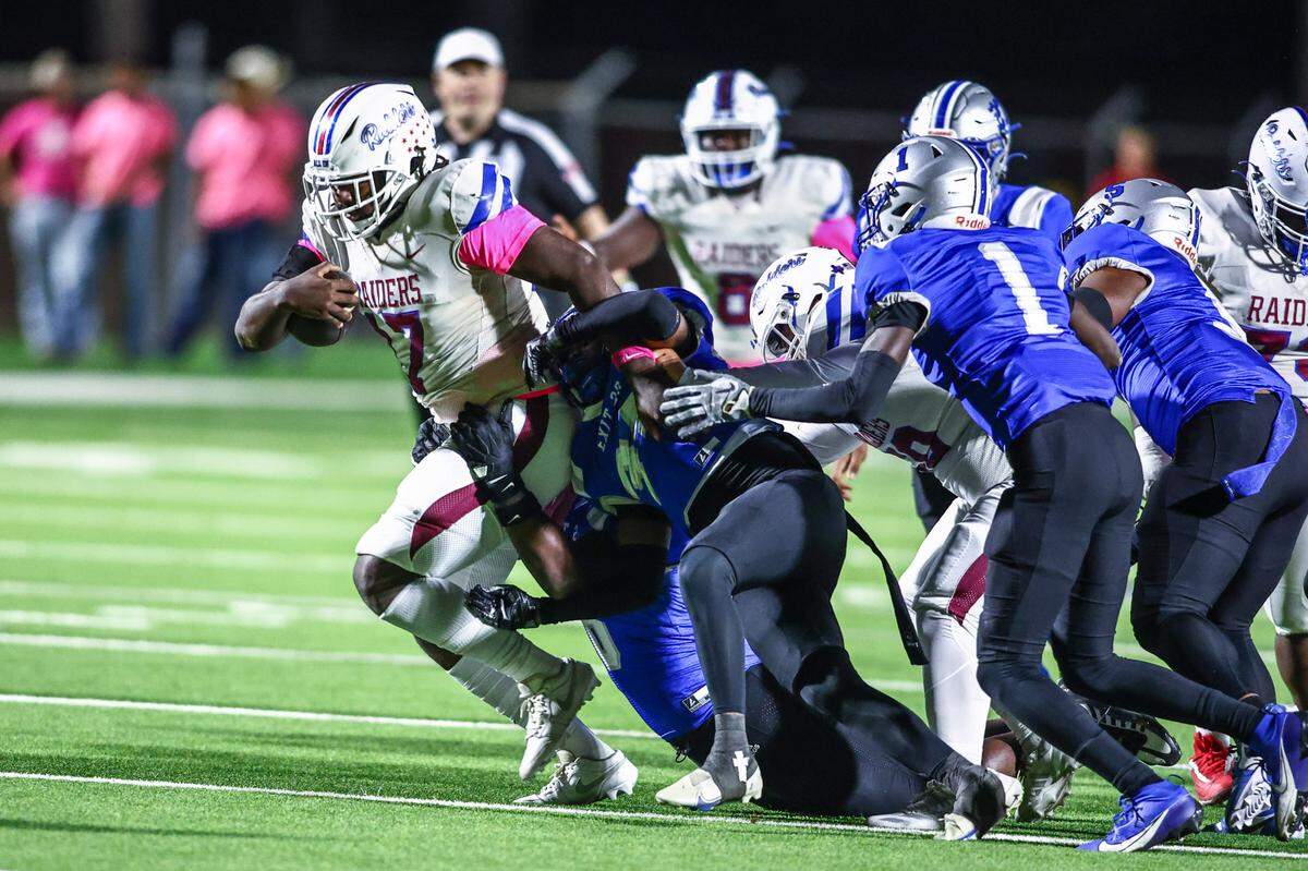 Fort Worth Southwest running back Raylon Carter is stopped by the Fort Worth Eastern Hills defense on Thursday, Oct. 17, 2024 at Scarborough-Handley Field in Fort Worth, Texas.