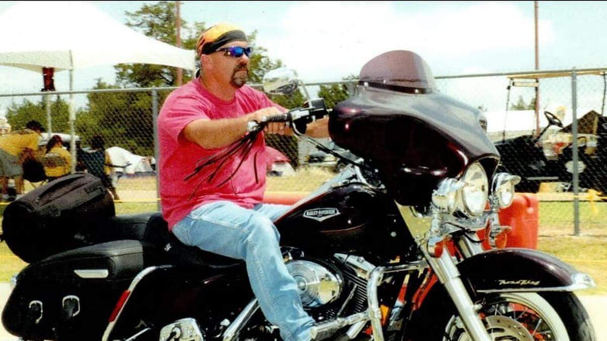 Randy Carter, shown on his favorite motorcycle just hours before his death in a fatal crash, loved making children happy at Christmas. His tradition of Santa delivering gifts on a motorcycle continues through the Randy Carter Foundation.