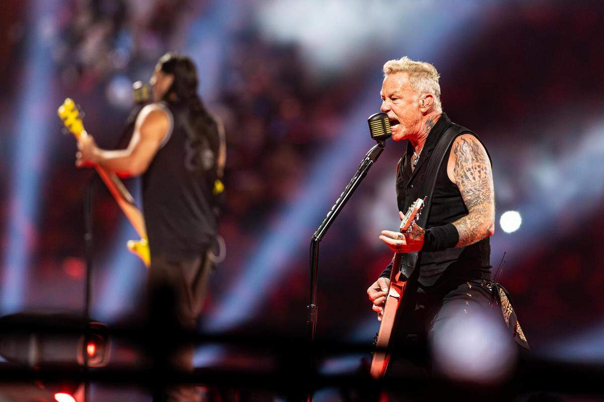 Lead vocalist James Hetfield performs with bass guitarist Robert Trujillo during the Metallica: M72 World Tour concert at AT&T Stadium in Arlington, Texas on Friday, Aug. 18, 2023.