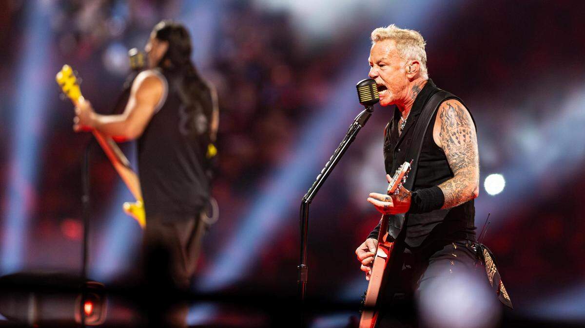 Lead vocalist James Hetfield performs with bass guitarist Robert Trujillo during the Metallica: M72 World Tour concert at AT&T Stadium in Arlington, Texas on Friday, Aug. 18, 2023.
