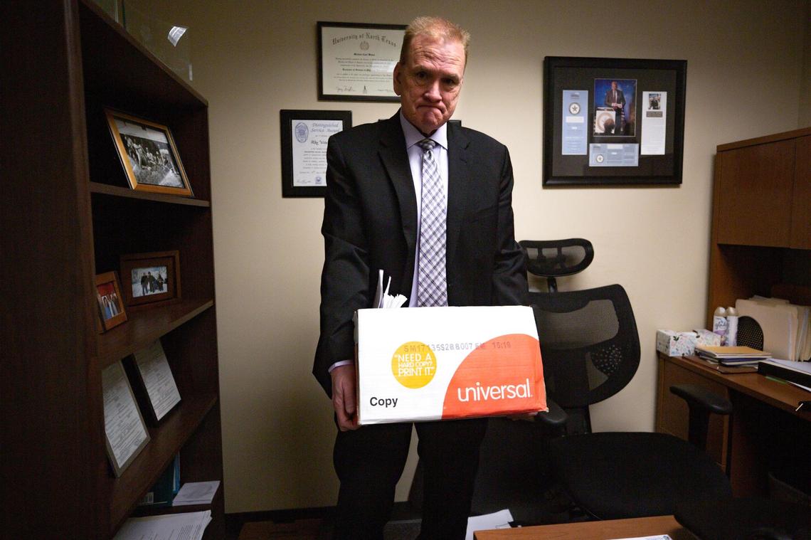 Tarrant County detective Mike Weber holds a box of files used to investigate one child medical abuse case, in his office at the Tarrant County Plaza Building on Saturday, Feb. 25, 2023. Weber has investigated 35 claims of medical child abuse, otherwise known as Munchausen syndrome by proxy.