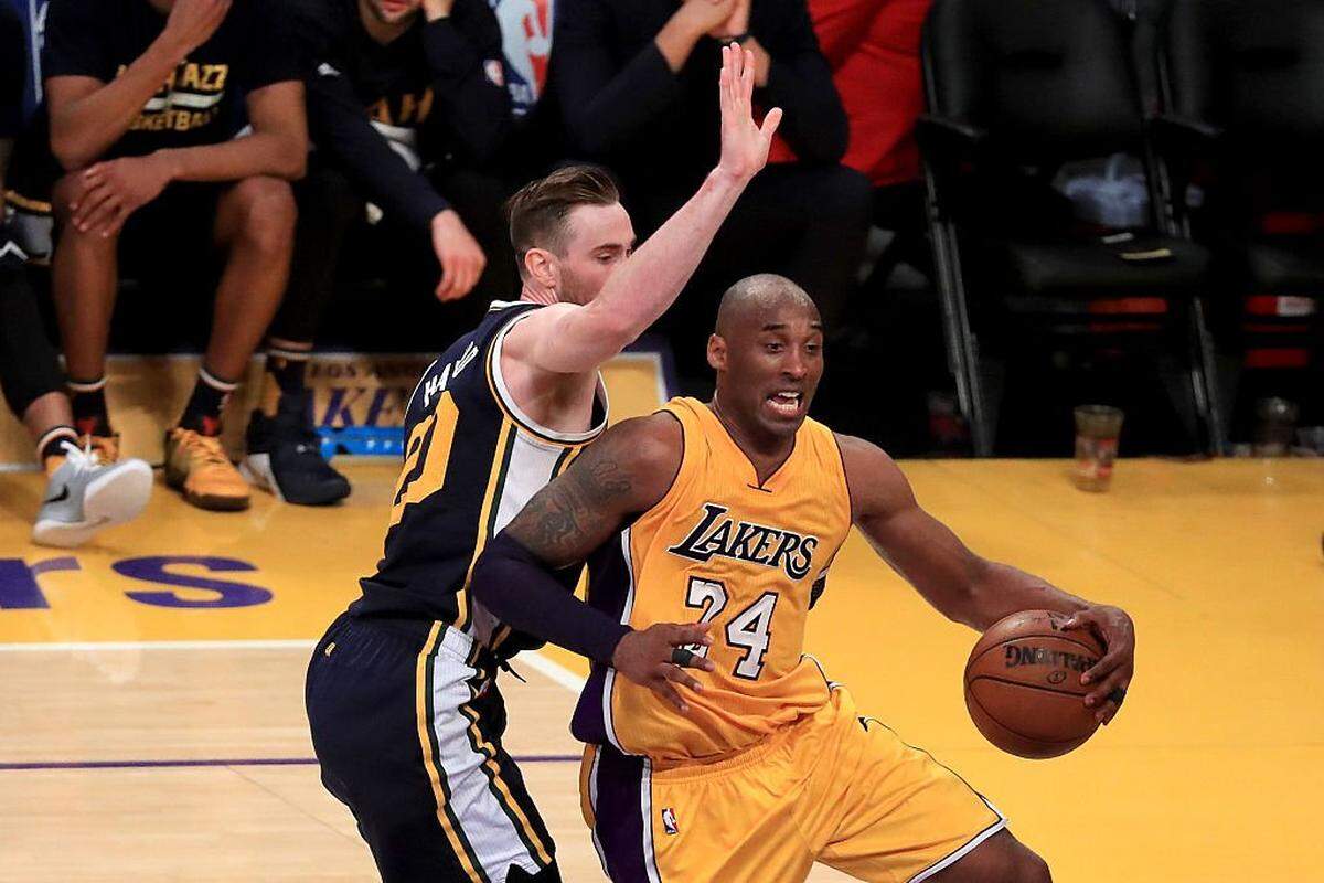 LOS ANGELES, CA - APRIL 13: Kobe Bryant #24 of the Los Angeles Lakers drives on Gordon Hayward #20 of the Utah Jazz in the fourth quarter at Staples Center on April 13, 2016 in Los Angeles, California. NOTE TO USER: User expressly acknowledges and agrees that, by downloading and or using this photograph, User is consenting to the terms and conditions of the Getty Images License Agreement. (Photo by Sean M. Haffey/Getty Images)
