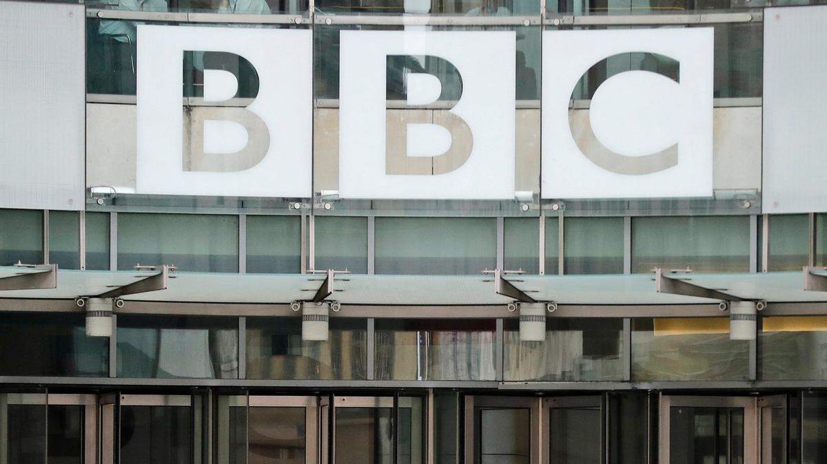 FILE - The BBC sign outside the entrance to its headquarters in London. Russians could face prison sentences of up to 15 years for spreading information that goes against the government’s position on the war in Ukraine. (AP Photo/Frank Augstein, File)