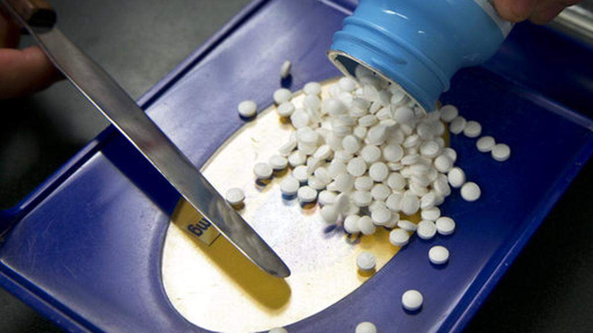 FILE - In this Friday, July 8, 2016 file photo, a prescription is filled at a pharmacy in Sacramento, Calif.