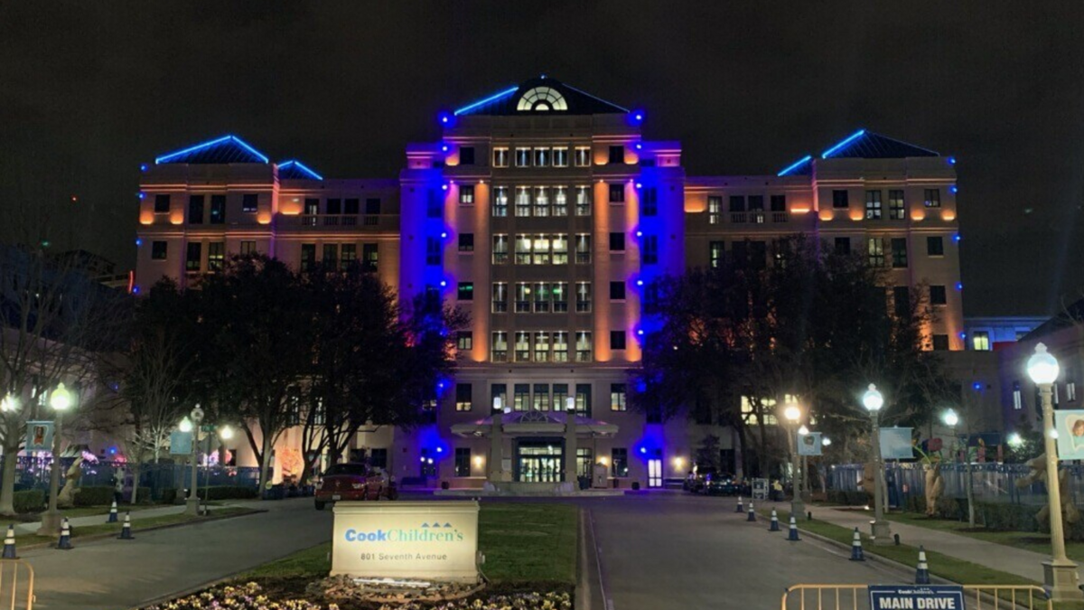 Cook Children’s Medical Center in Fort Worth added gold lights to its standard blue Wednesday night in a show of support to Ukraine after the Russian military reportedly destroyed a maternity ward during its invasion of one of the nation’s port cities.