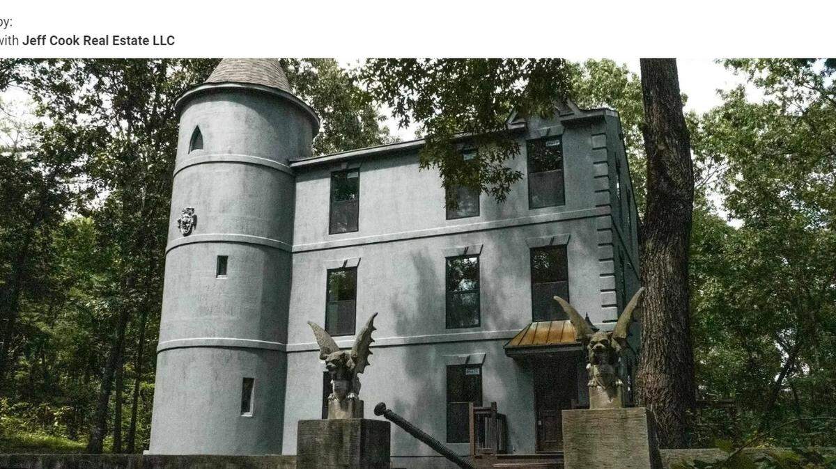 The gates of the home has two gargoyles “guarding”