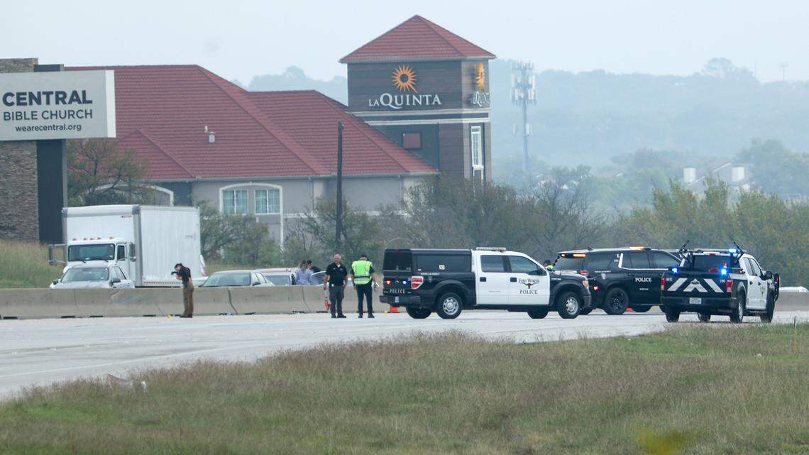Members of the Fort Worth police department investigate a road rage shooting on Interstate 30 near Cooks Lane in east Fort Worth on Tuesday, November 8, 2022.