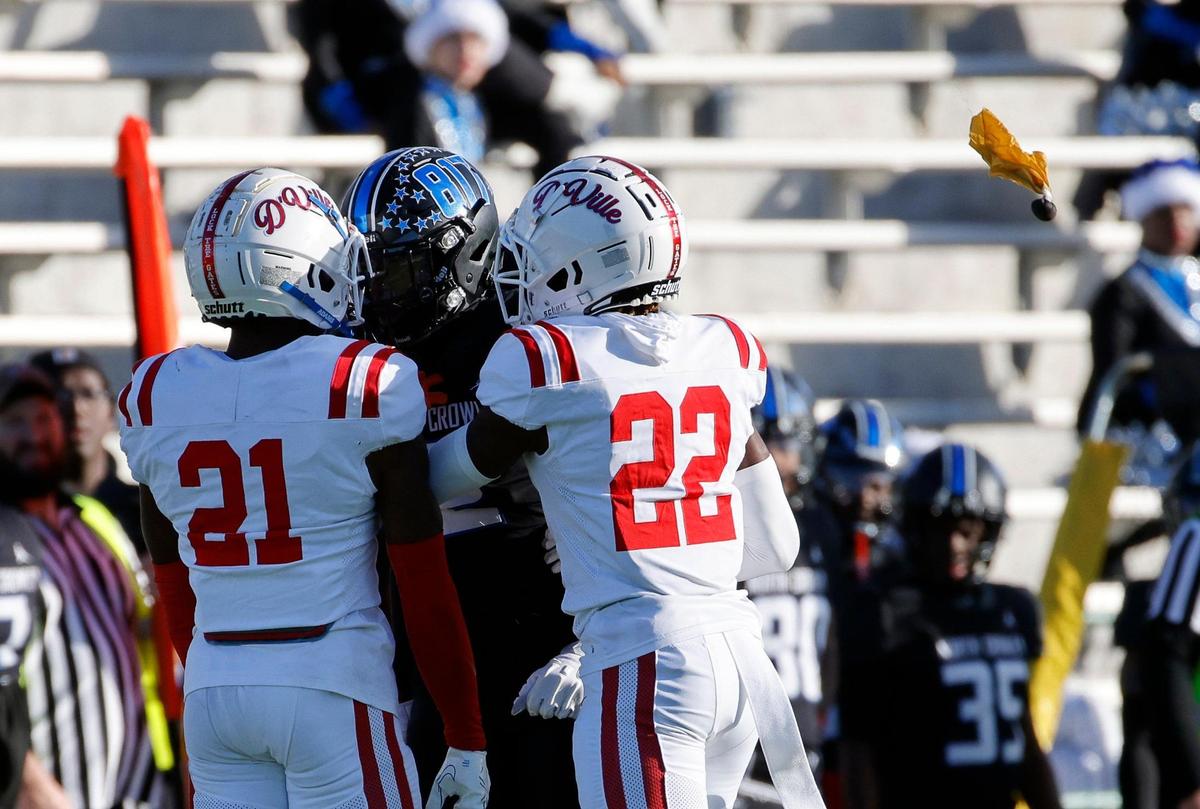 Duncanville defensive backs Tyren Polley (21) and Taj Degrate (22) were called for unsportsmanlike conduct for shoving after the play during the first half of a UIL Conference 6A Division I state semifinal football playoff game at Mesquite Memorial Stadium in Mesquite, Texas, Saturday, Dec. 09, 2023. Duncanville led North Crowley 24-0 at the half.