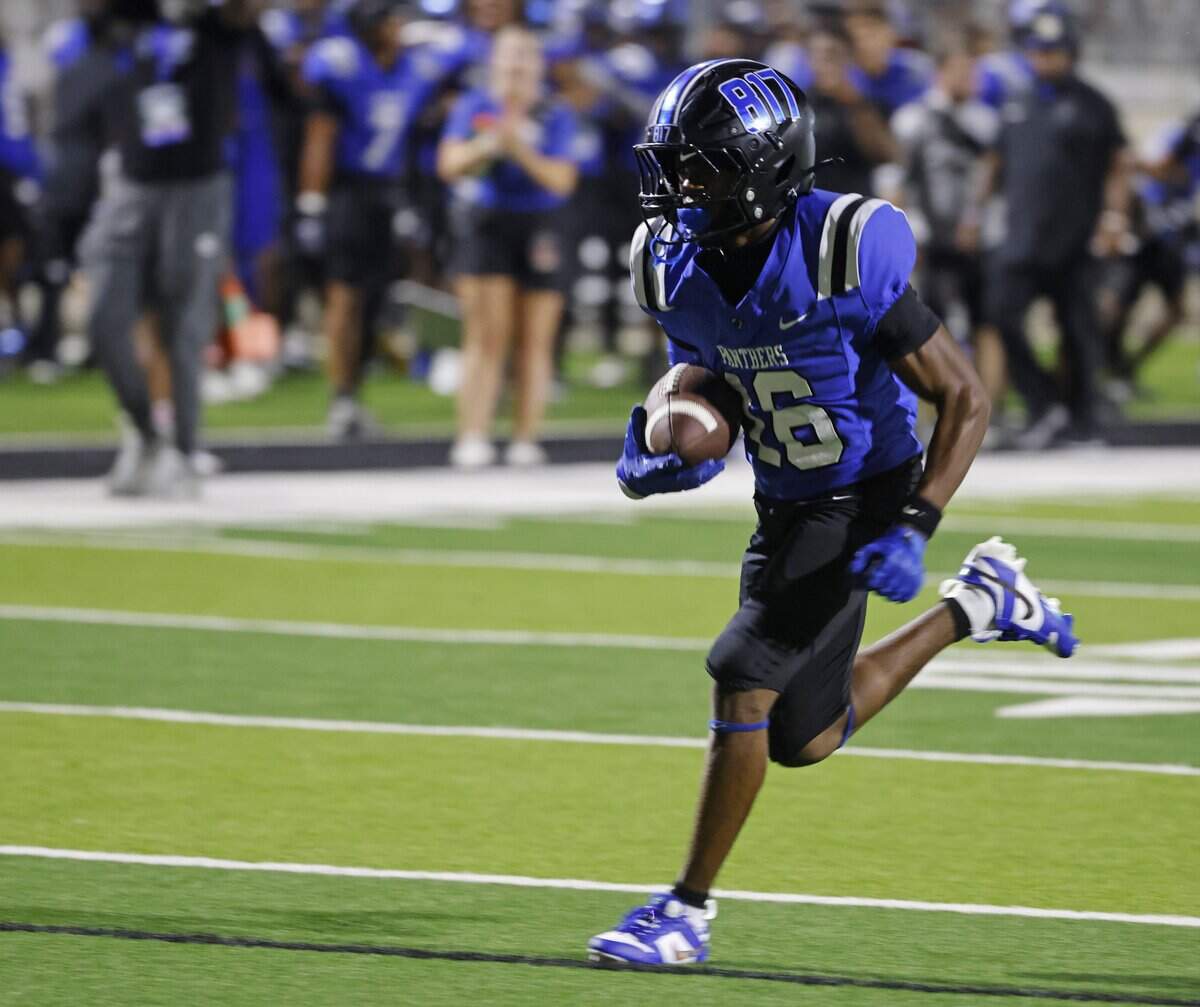 North Crowley WR Pryce Demerson takes in the winning score during the second half of a UIL football game at Crowley ISD Stadium in Crowley, Texas, Thursday, August 28, 2025.
