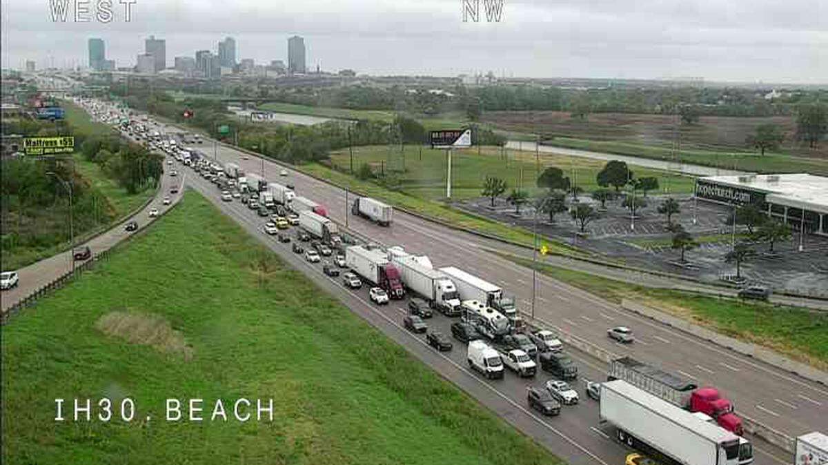 Traffic on I-30 eastbound backs up Thursday afternoon as a result of an 18-wheeler which overturned near the Oakland Blvd. exit.