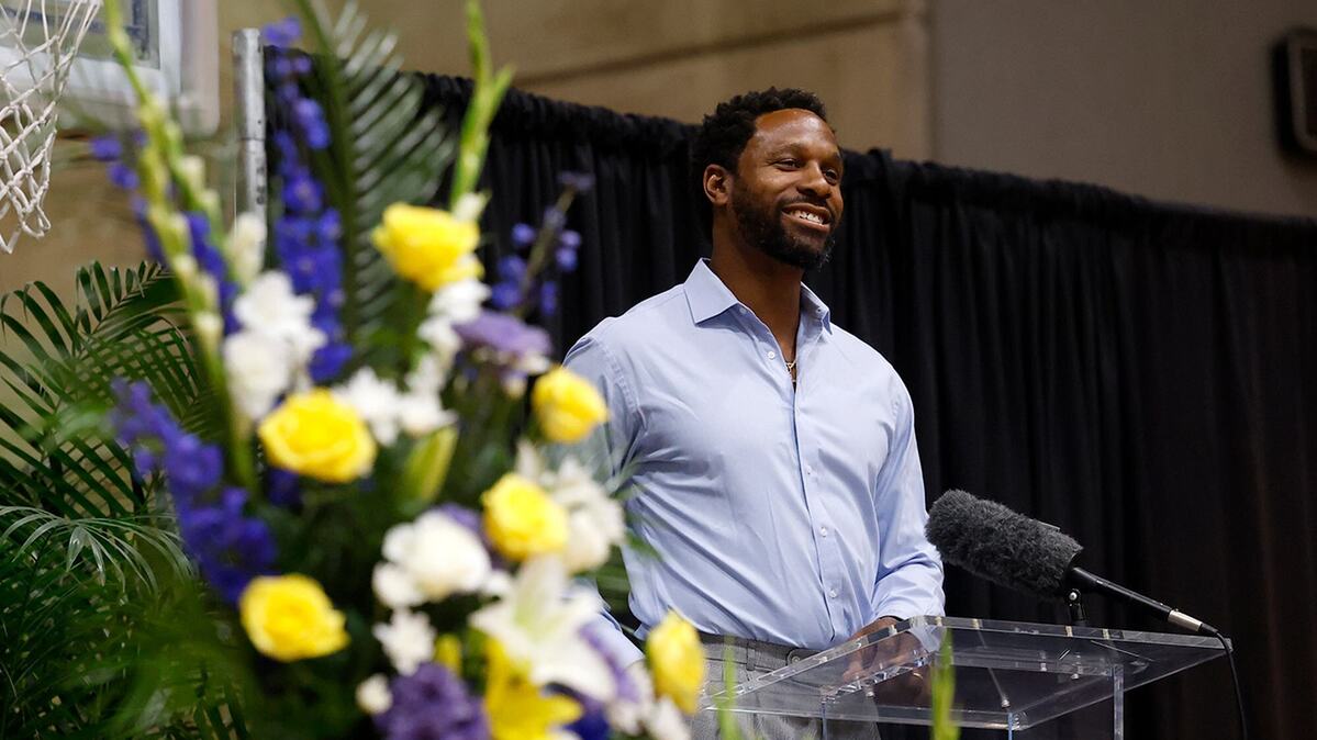 Jeremis Smith, a former player at Dunbar High, speaks during a memorial service for legendary high school basketball coach Robert Hughes on Friday, June 28, 2024, at Wilkerson-Greines Activities Center in Fort Worth. Hughes coached for decades at Dunbar High School and became the all-time winningest coach in the history of high school boys basketball.