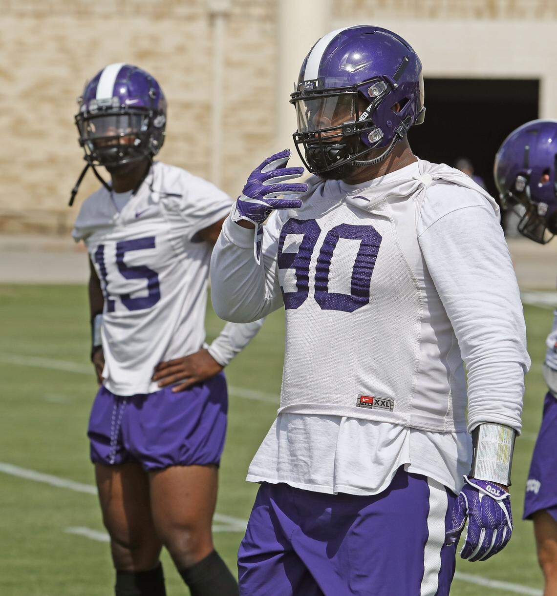 Ben Banogu (DT, 15) and Ross Blacklock (DT, 90) as the TCU Horned Frogs hold their first regular preseason practice in Fort Worth, Saturday, August 4, 2018.