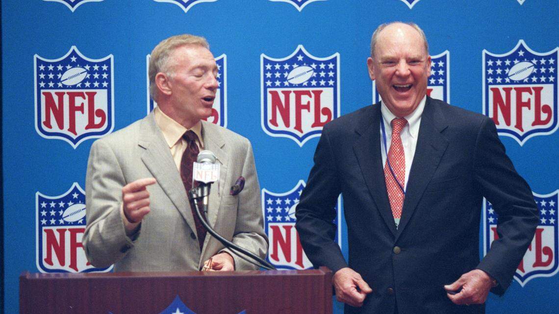 Texans owner Bob McNair, right, reacts to Dallas Cowboys owner Jerry Jones’ reference to McNair’s team as the “Houston Oilers” at a press conference during a break in NFL owners meetings in 2002.