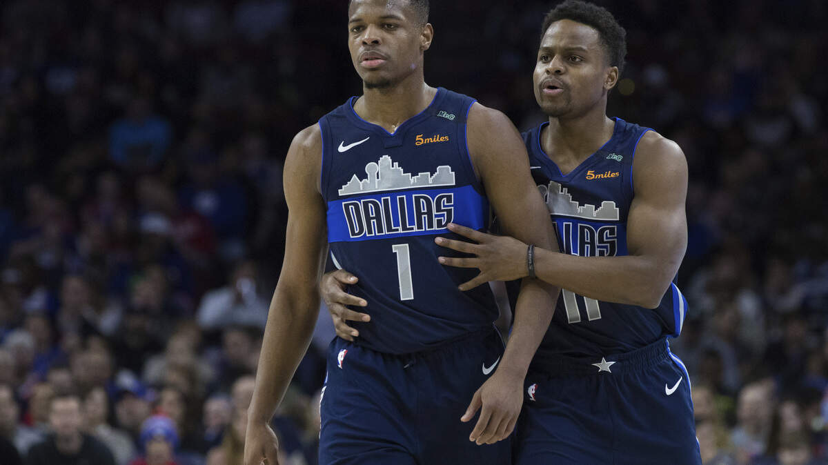 Dallas Mavericks guards Dennis Smith Jr., and Yogi Ferrell, right, had some big moments during the season.