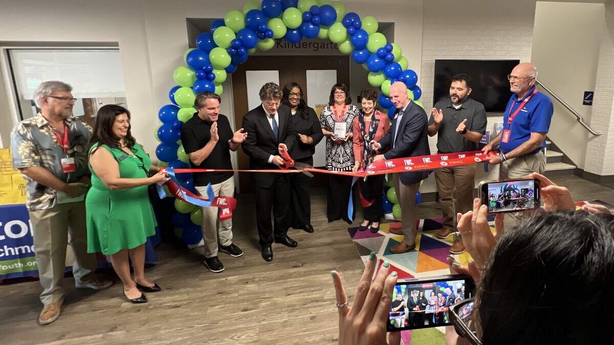 Officials of Clayton Youth Enrichment, various Fort Worth chambers of commerce and Broadway Baptist Church cut a ribbon during an opening of a new child care facility in Fort Worth’s Near Southside neighborhood on Monday, Nov. 6, 2023.