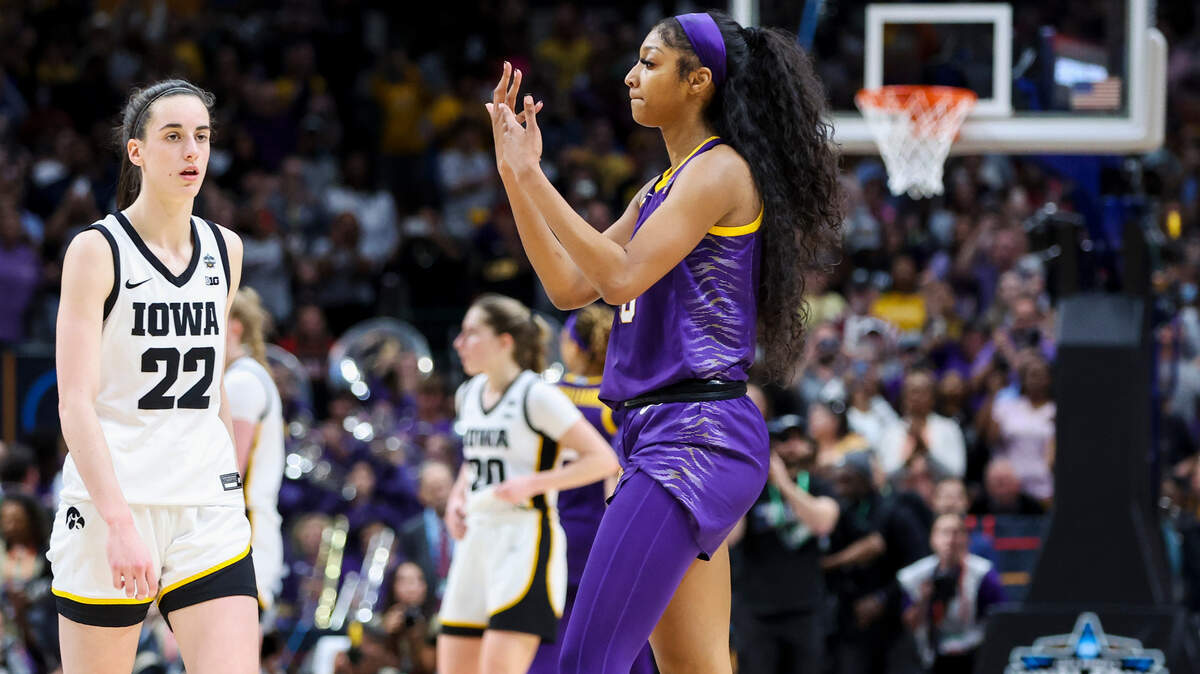 LSU Lady Tigers forward Angel Reese (10) gestures towards Iowa Hawkeyes guard Caitlin Clark (22) in the closing minutes of their NCAA championship game on Sunday.